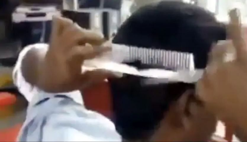 viral video of man who cut their hair by own ias give hilarious reaction on it