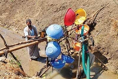 know the story of  karnataka farmer who produce electricity through water mill