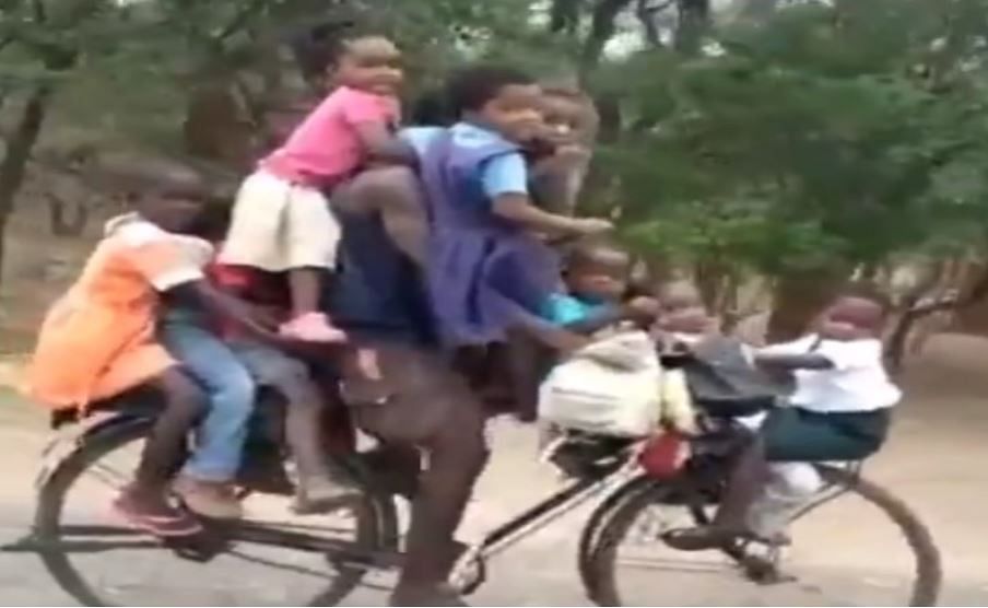 viral video of father who travelled with 8 children in cycle people will love this amazing jugaad
