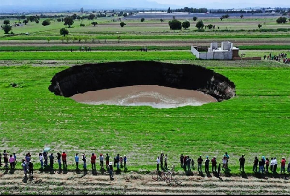 Giant sinkhole appears in Mexico farmland threatens to swallow house