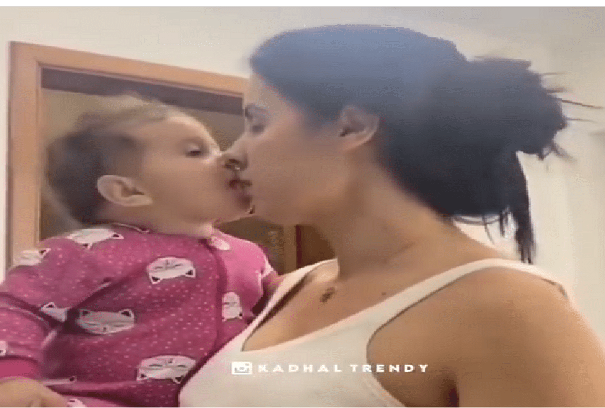 baby licks mothers lips to taste drink funny video is getting loved on internet