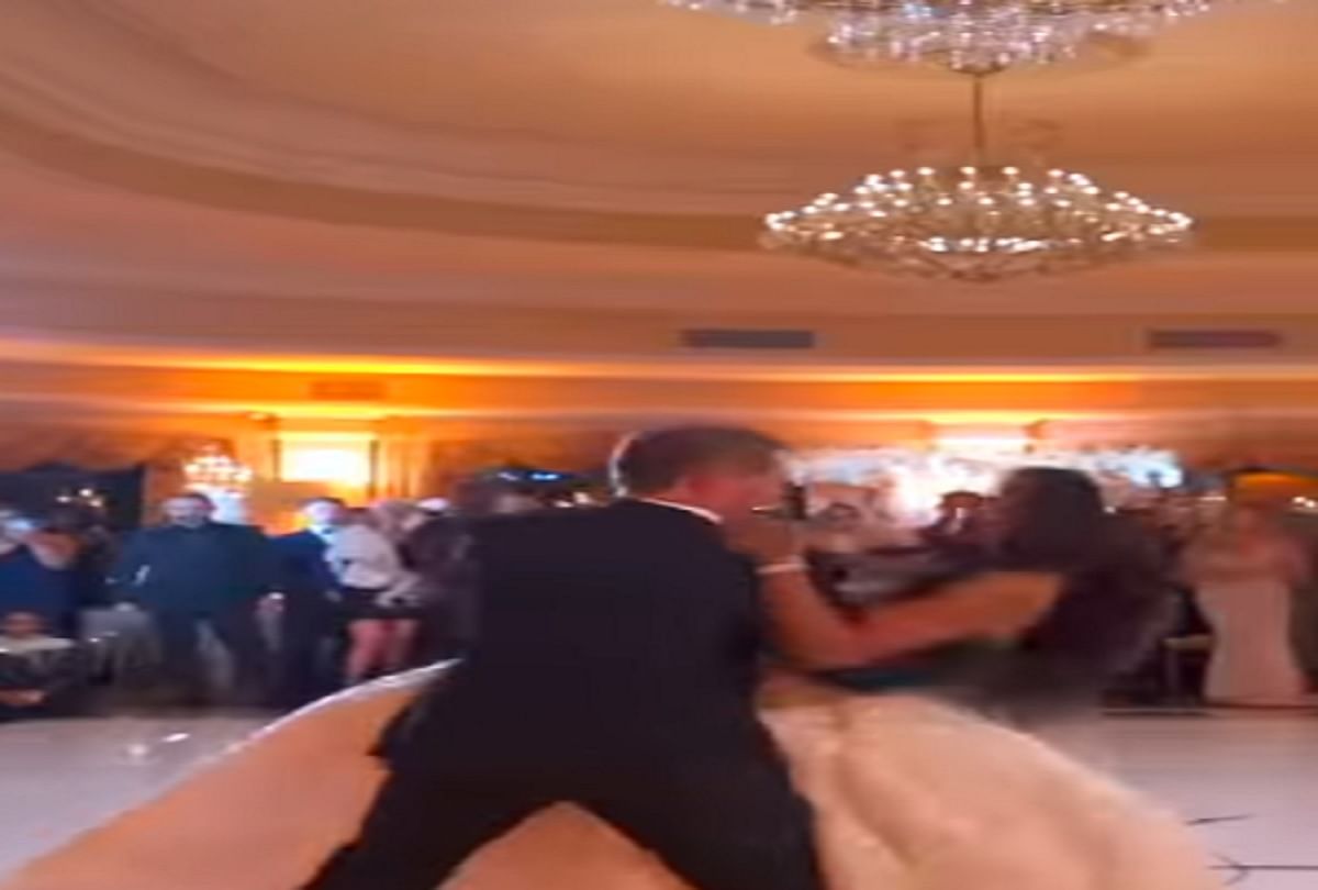 bride and groom fell down on floor while doing a romantic dance video goes viral on social media