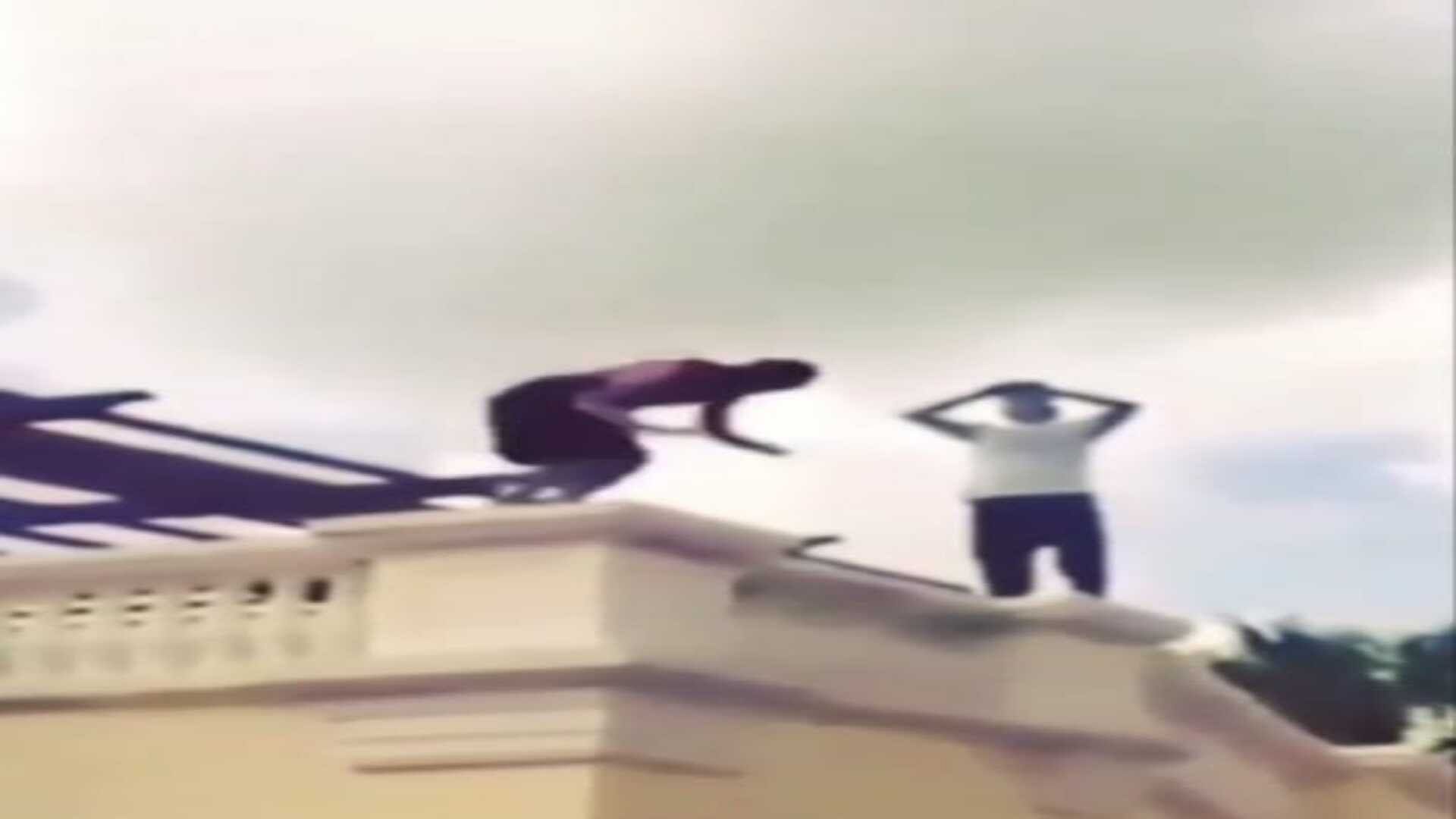 During stunt man standing on the railing then fell down video goes viral on social media