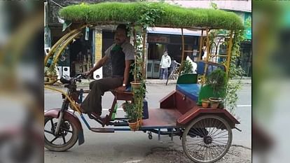 green e-rickshaw