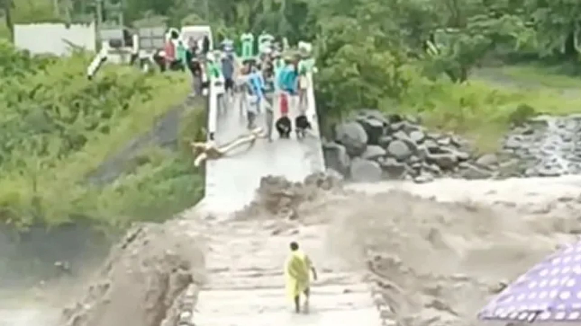 Person Started Crossing The Swollen River Video Went Viral On Social Media