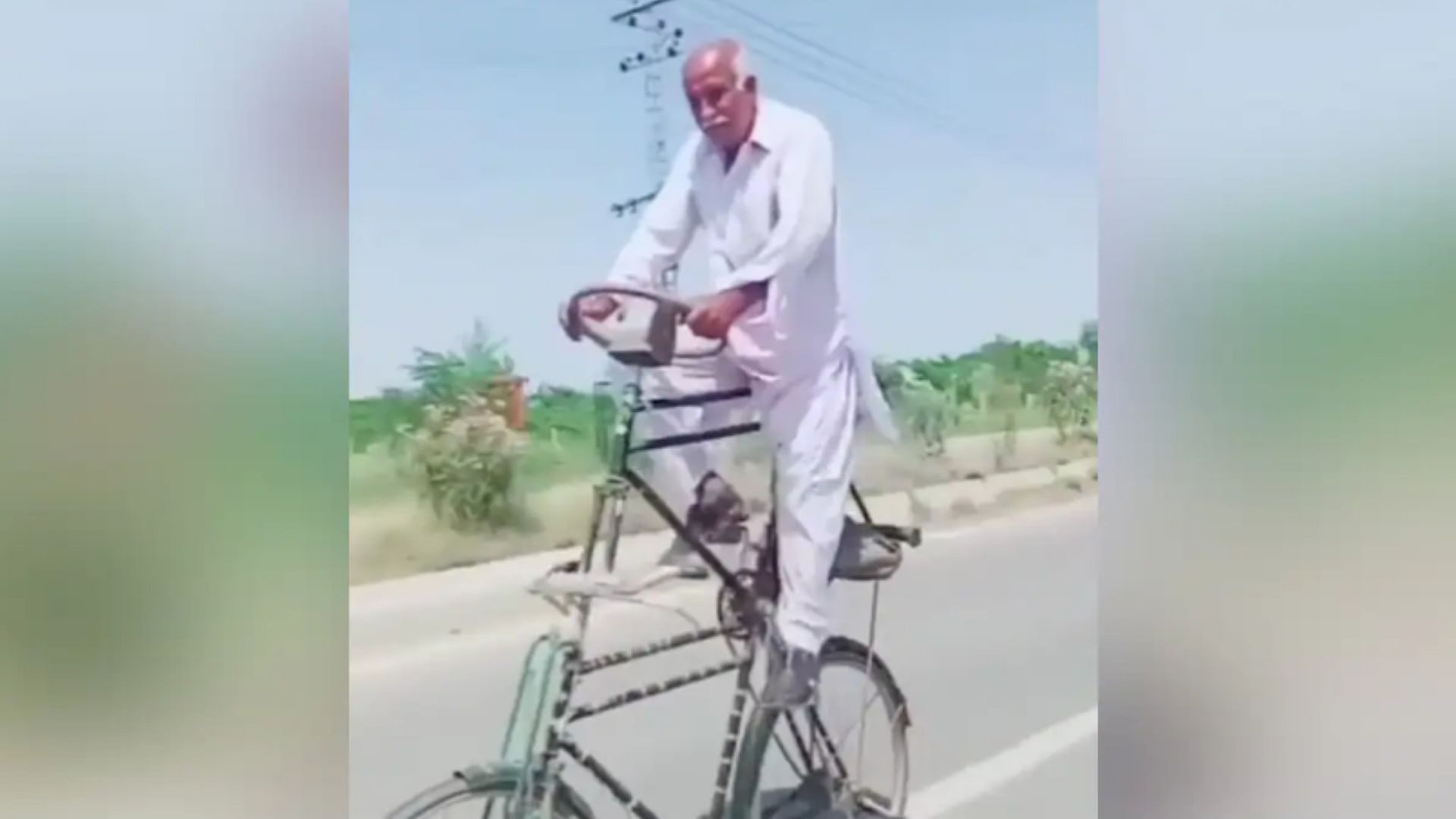Jugaad Video Man riding on a double decker cycle on road video viral