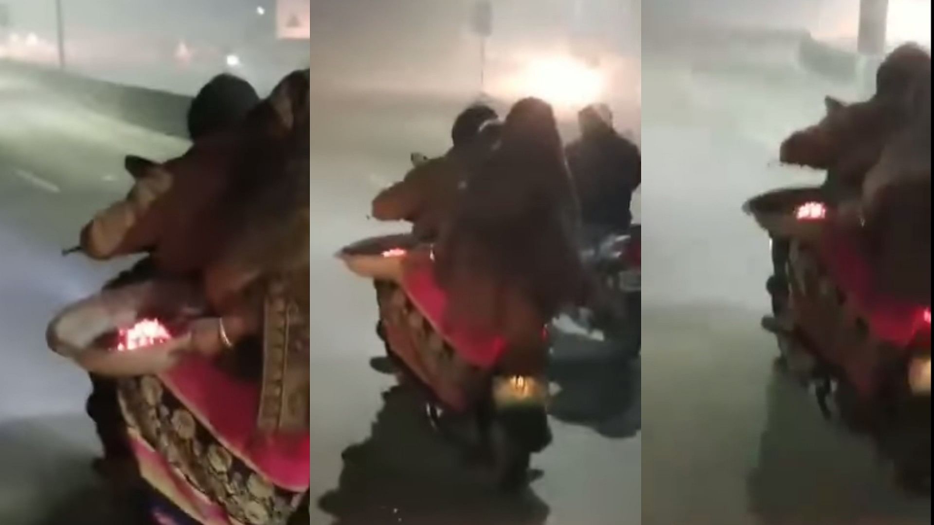 Woman Spotted Riding Bike With Burning Fire On Lap In Chilling Winters In Allahabad Video Viral
