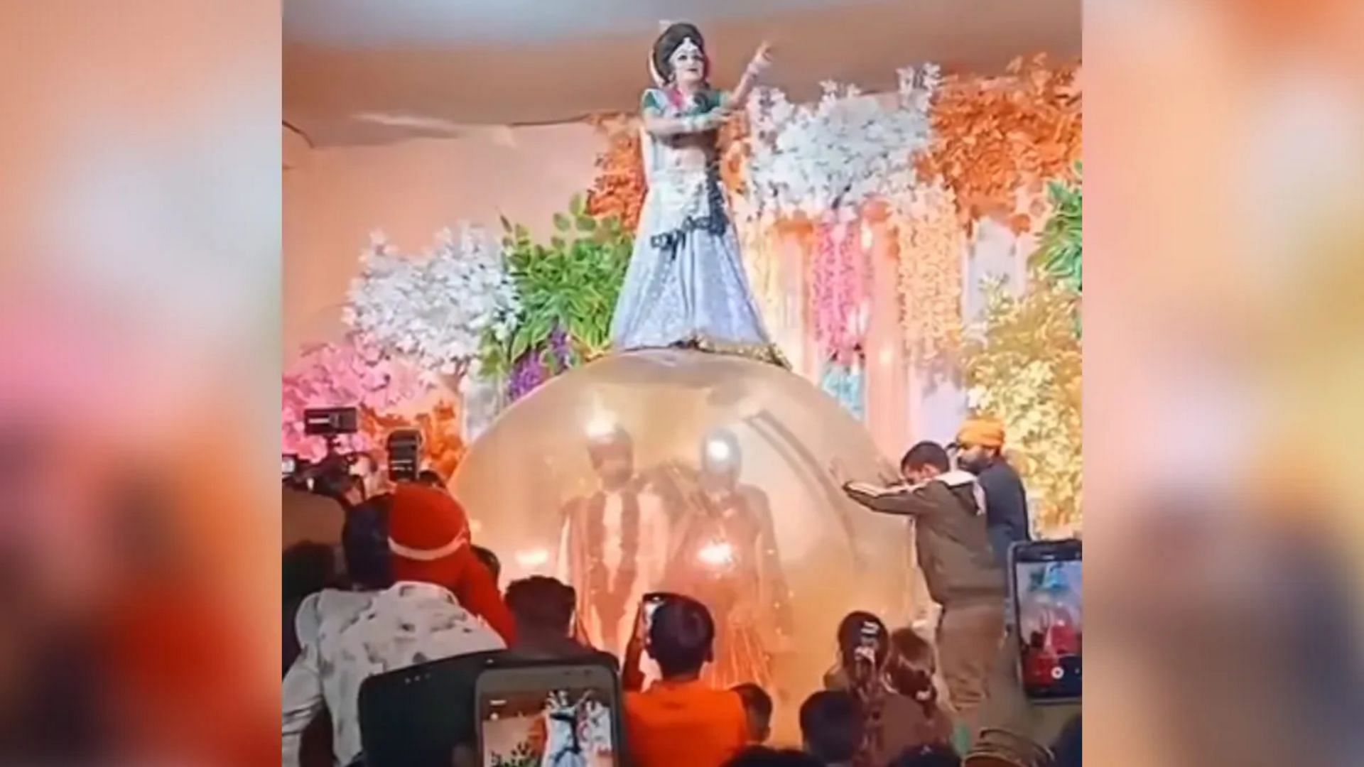 Viral Video Dancer seen dancing above the head of the bride and groom weird wedding video