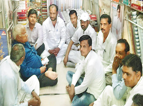 Bullion traders pulled by procession