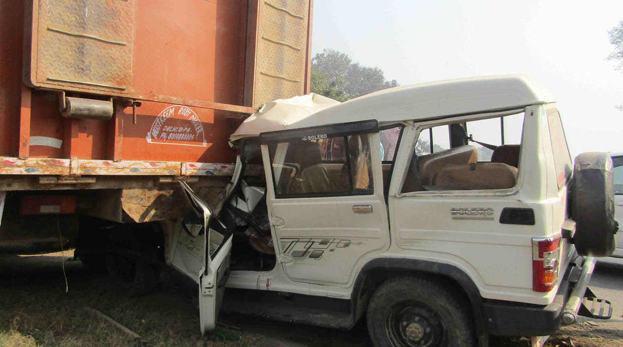 Collided with the truck parked car, five injured