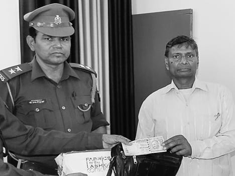 The inspector returned to the road got a bag full of notes