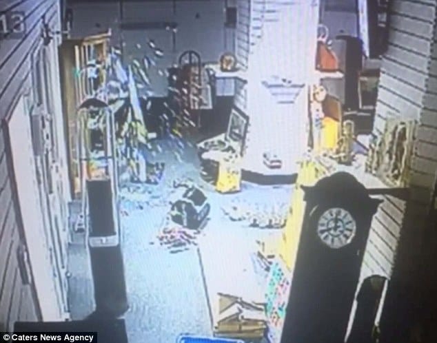 spooky moment when glass cabinet shatters into pieces