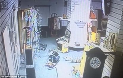 spooky moment when glass cabinet shatters into pieces