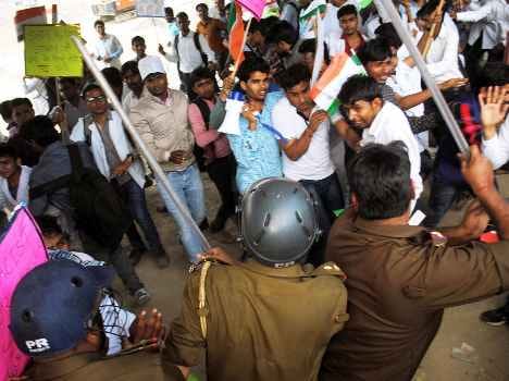 Police lathi charged at protesters.