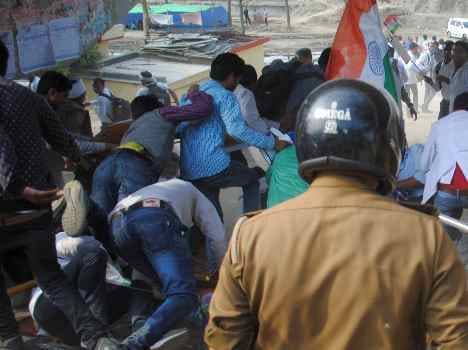 Police lathi charged at protesters.