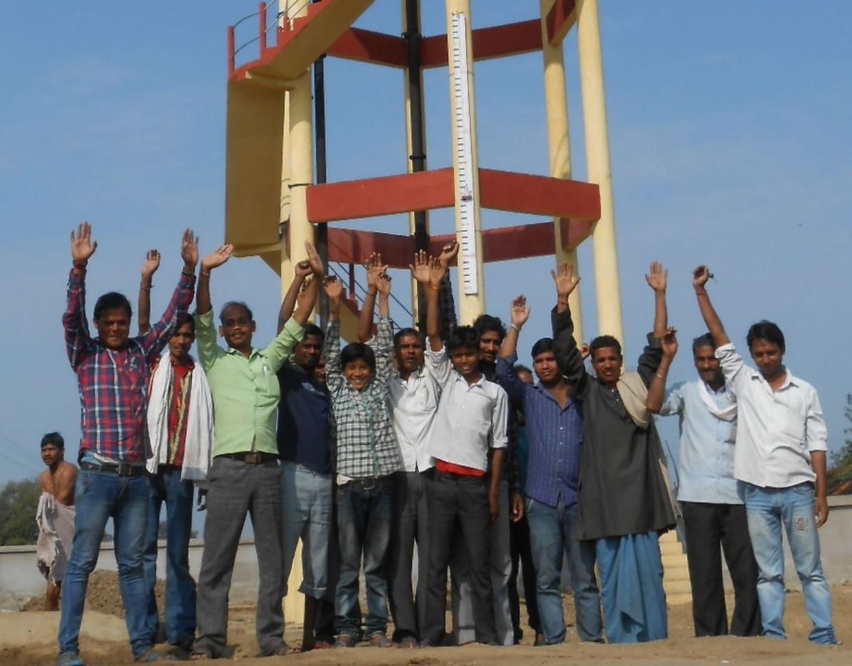 Villagers on the water tank on dharna
