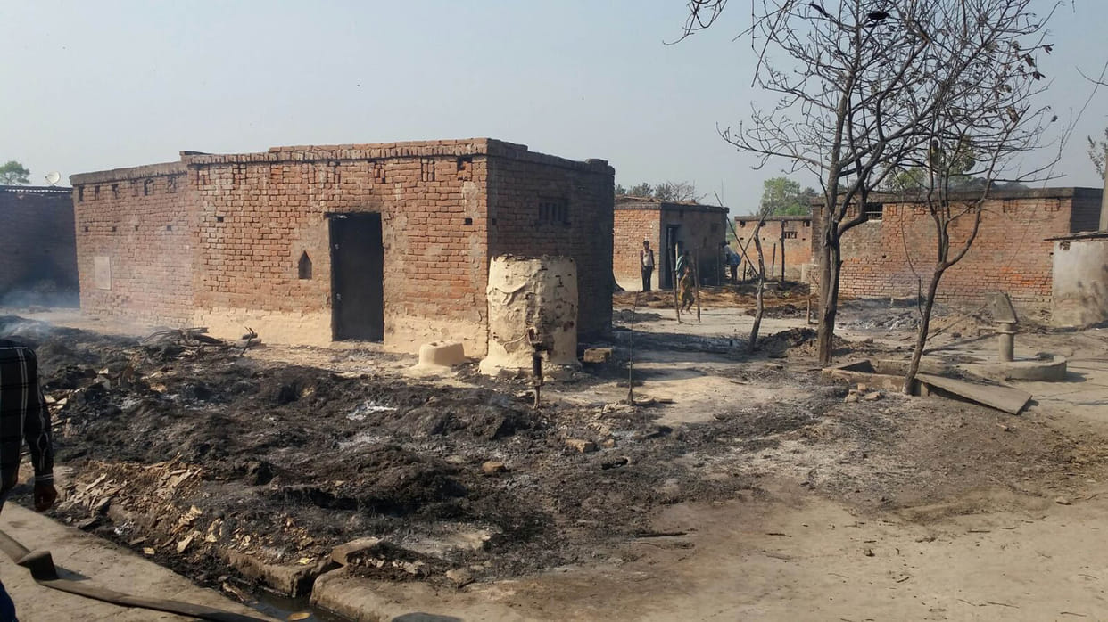 Sixty huts burn
