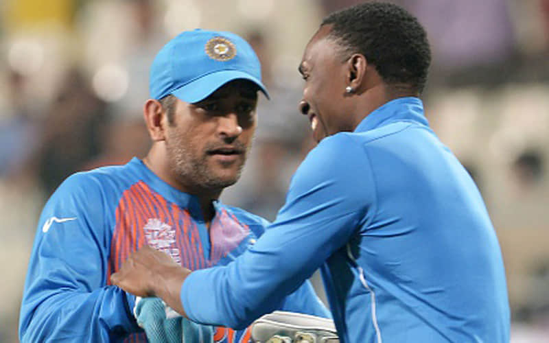 dywane bravo and ms dhoni enjoying after warm-up match