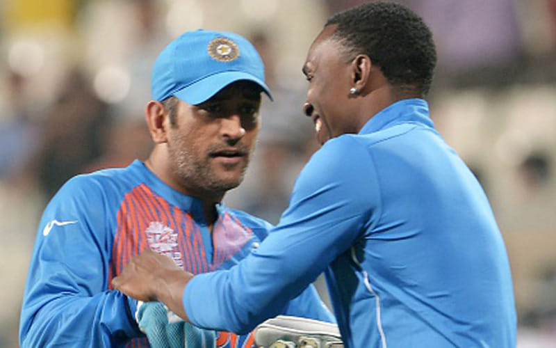 dywane bravo and ms dhoni enjoying after warm-up match