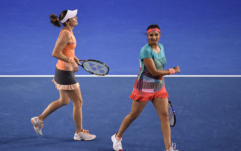sania mirza and martina hingis enter second round