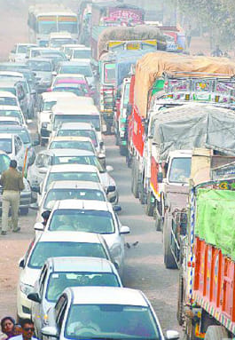 Highways jammed for a third day