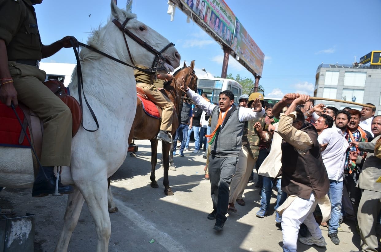 BJP MLA ganesh joshi beaten police horse.