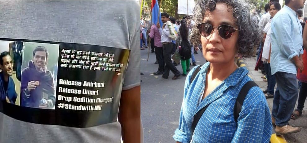 arundhati roy joins march of jnu students for release of khalid and anirban