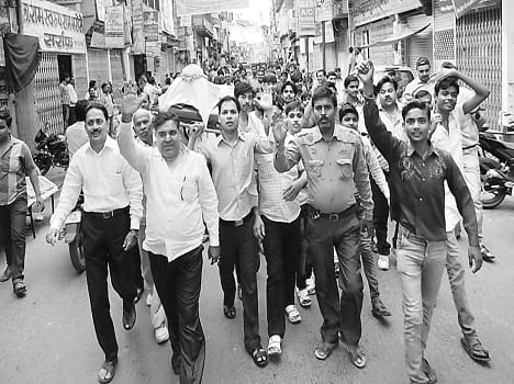 FM's effigy burnt out procession