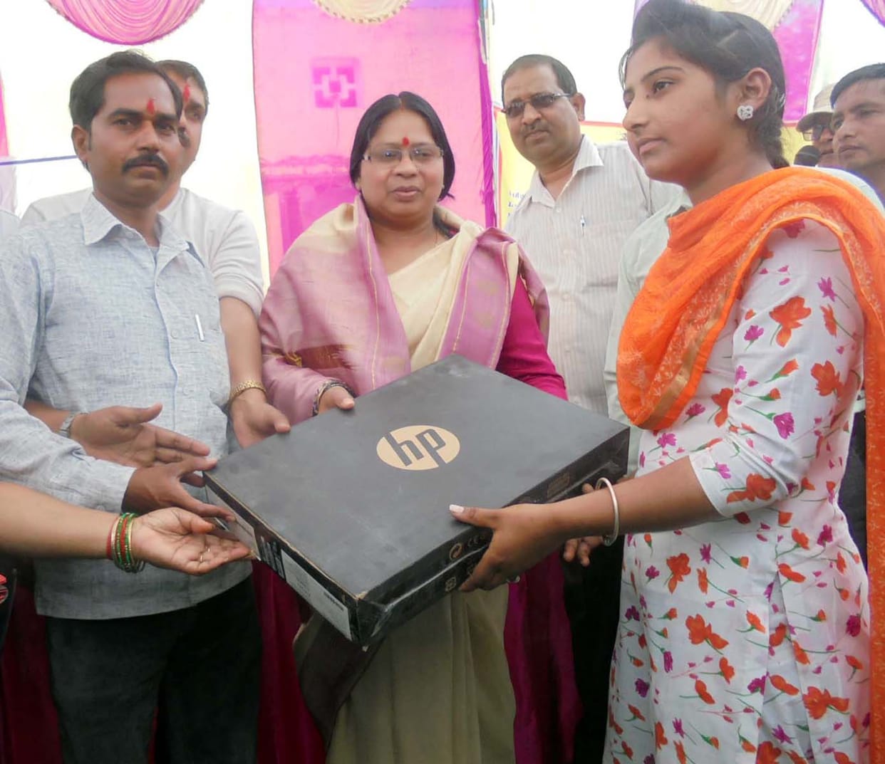 The laptop and certificates to the beneficiaries