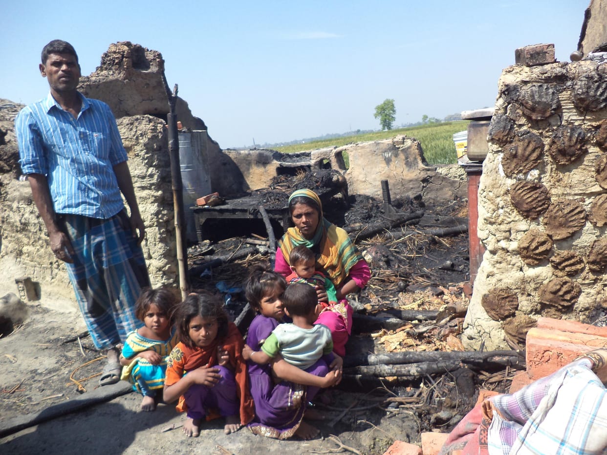 The fire burnt hut, scorched siblings