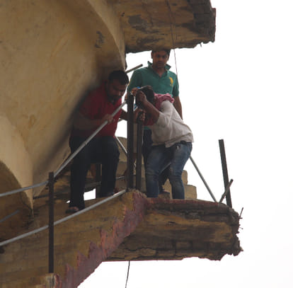 student climb on the water tank