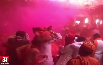 Devotees play 'laddoo Holi' in Mathura