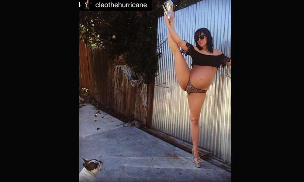 Pregnant Pole dancer poses sexy before delivery