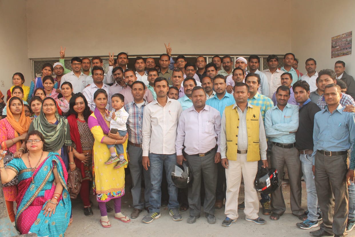 Trainee teachers surrounded Biio