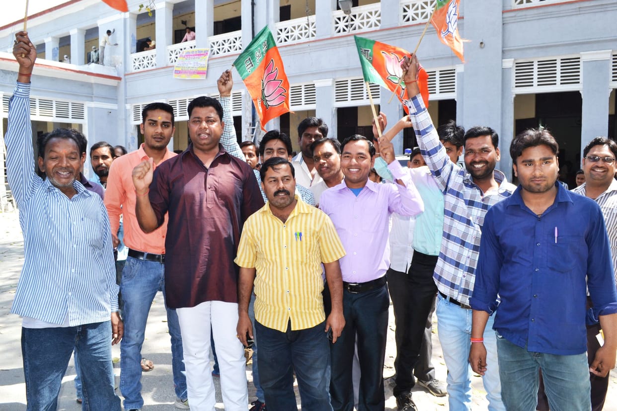BJP workers demonstrating against dirt