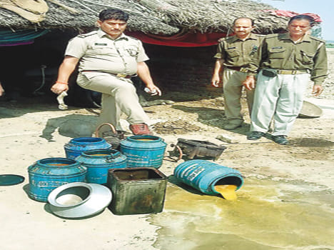 Raw alcohol with nine arrested