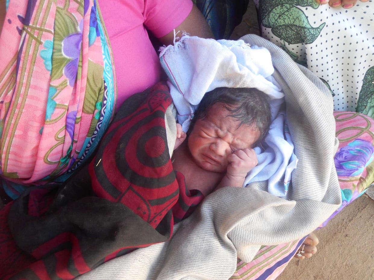 Was born in the bush, couple adopted