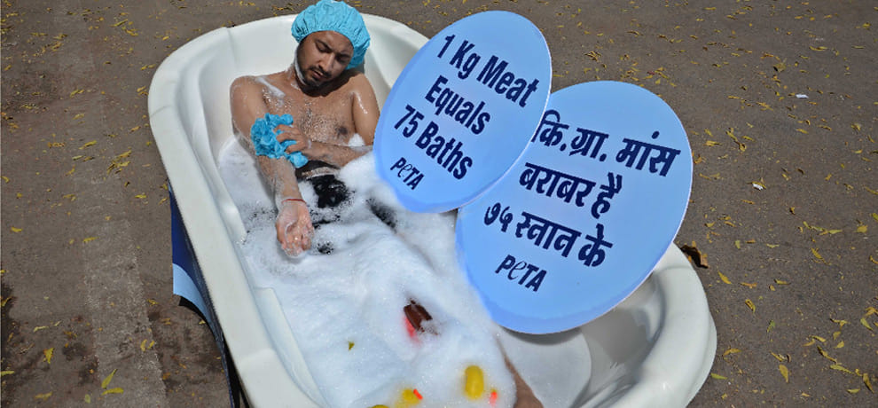 on the road a person bath in a tub