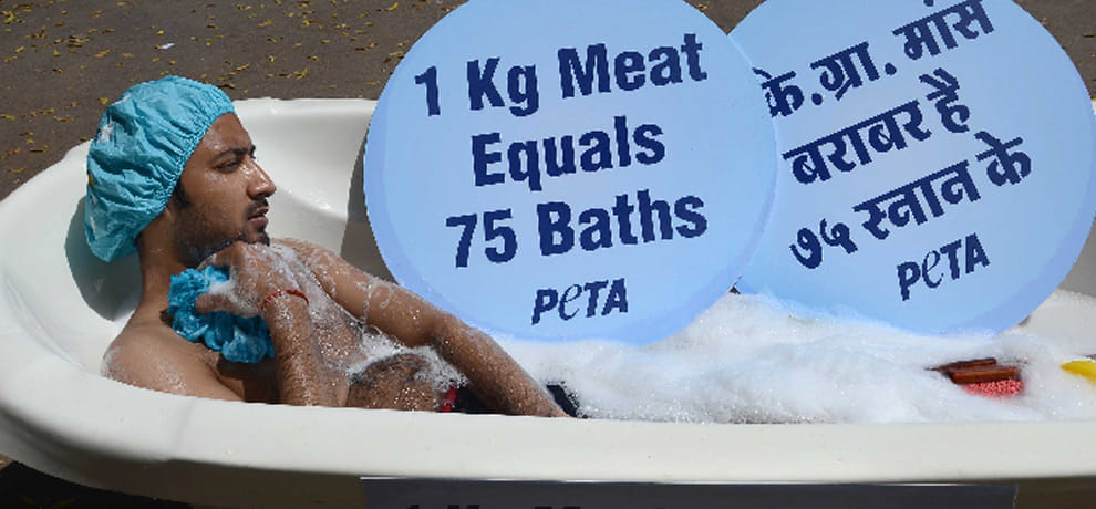 on the road a person bath in a tub
