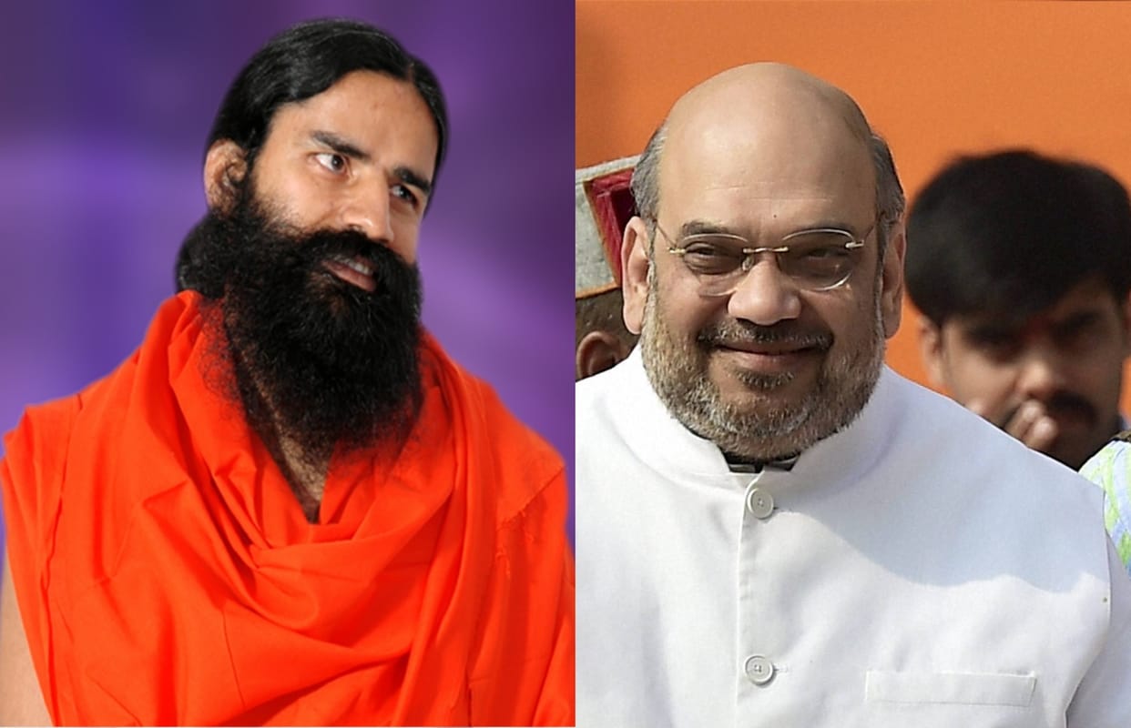 congress blame amit shah and baba ramdev for conspiring.