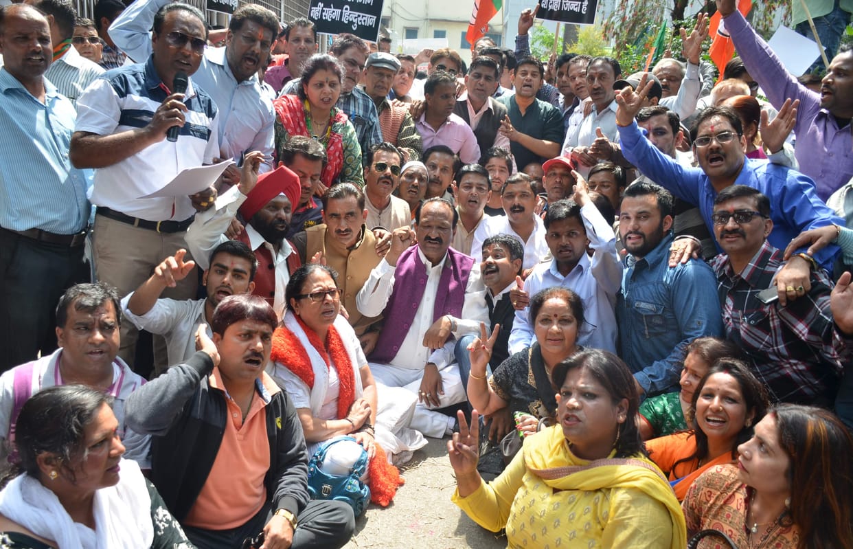 bjp protest against congress in dehradun.