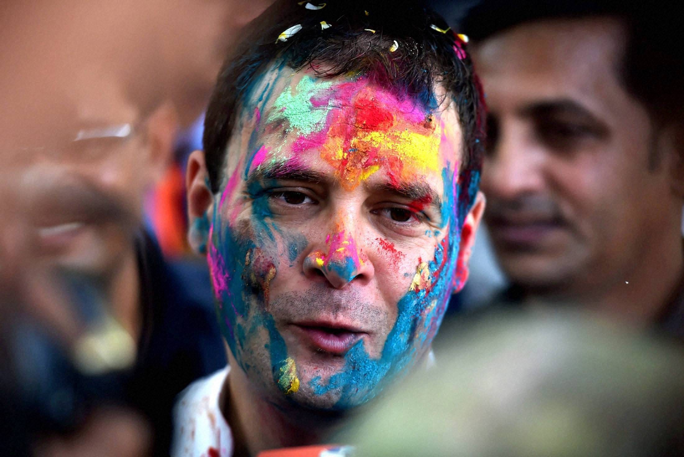 politician play holi in Different moods