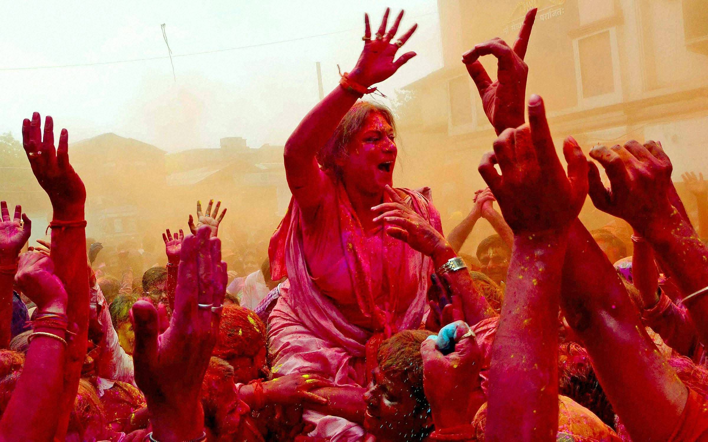 politician play holi in Different moods