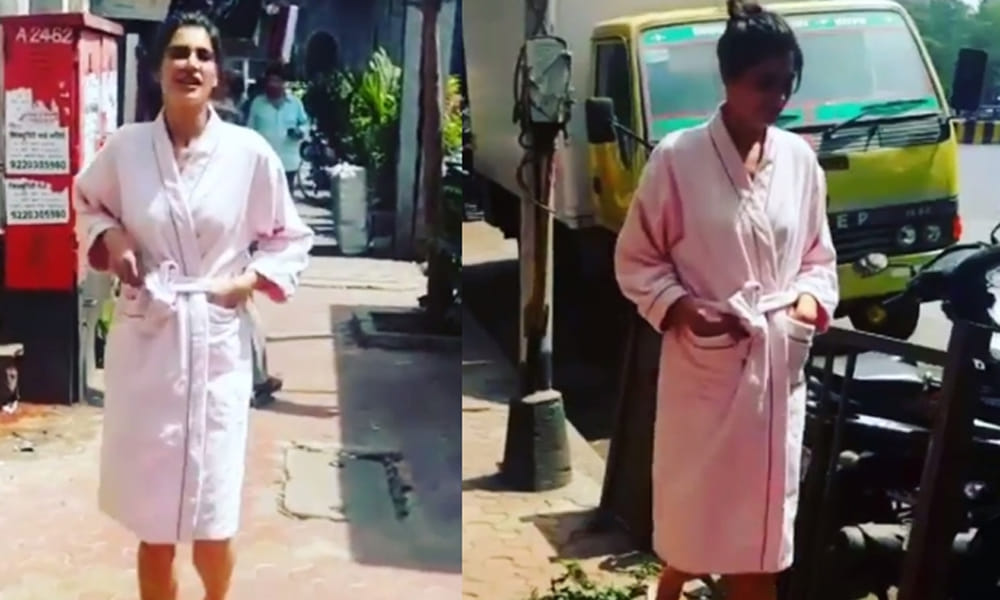 Nargis Fakhri walks in a bathrobe on Mumbai streets