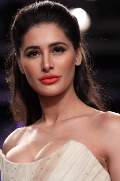 Nargis Fakhri walks in a bathrobe on Mumbai streets