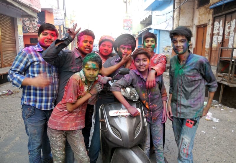 People immersed in the fun of Holi
