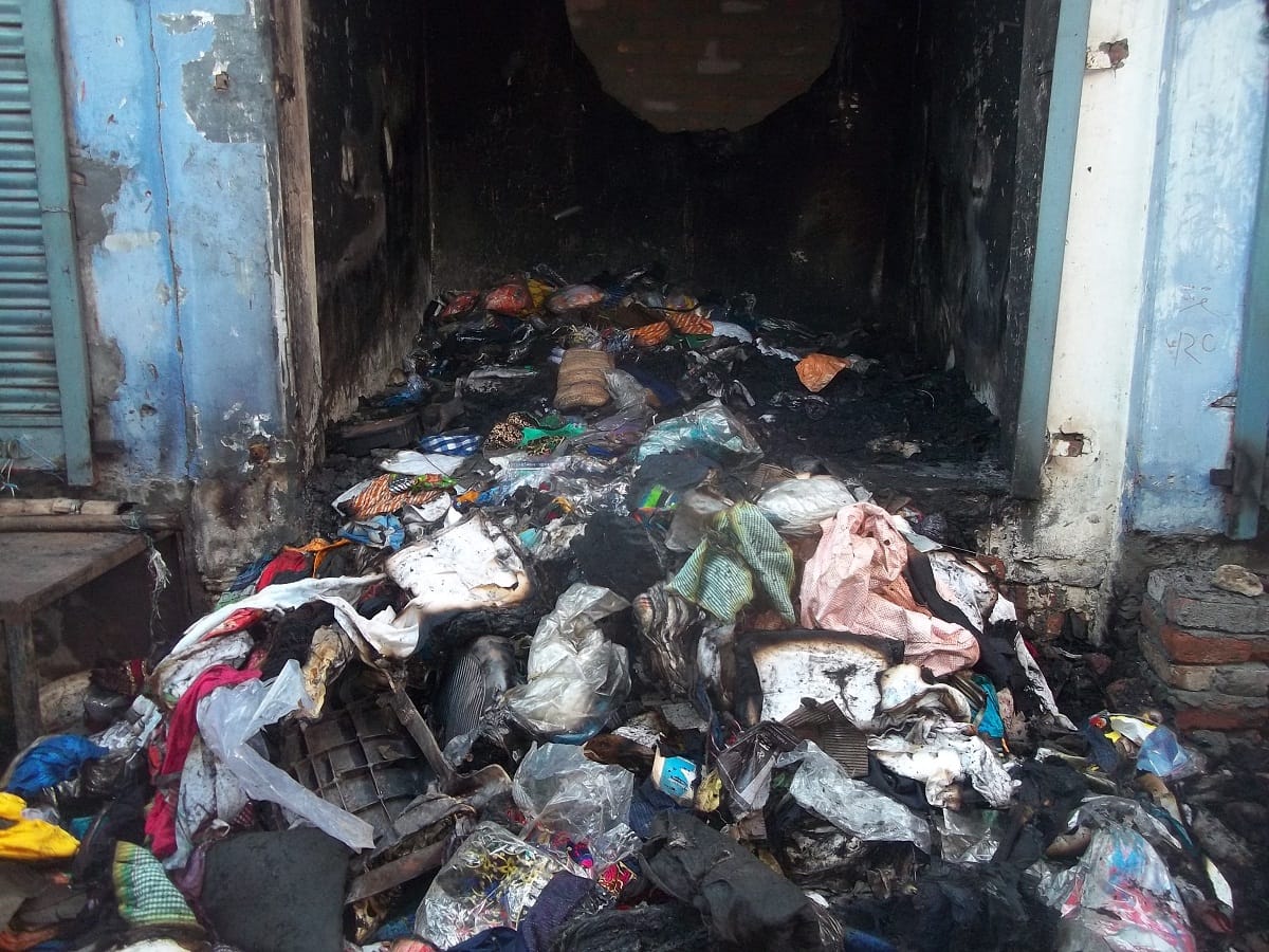 Clothing store fire burn millions goods