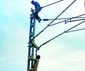 Insane climbed Railway Electric Pole 