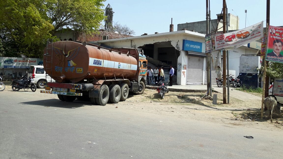 Tanker rammed into a car showroom, a death