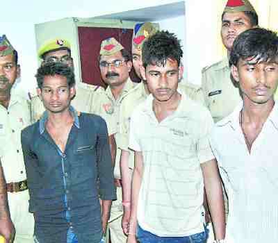 Three kidnappers holding